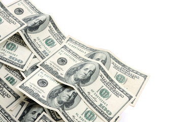 A lot of one hundred dollar bills isolated on white