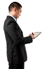 Businessman working on digital tablet