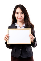 Naklejka premium Business woman holding a blank white board