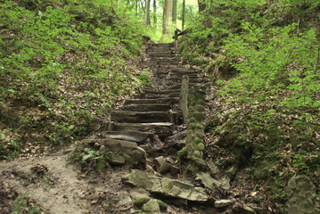 Fototapeta premium Ancient wooden stairs, mountain stairway