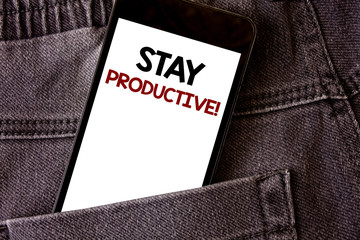 Writing note showing Stay Productive Motivational Call. Business photo showcasing Efficiency Concentration Productivity Words written black Phone white Screen Back pocket grey jeans trousers