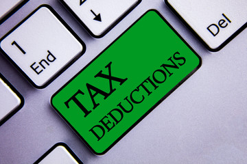 Text sign showing Tax Deductions. Conceptual photo Reduction on taxes Investment Savings Money...