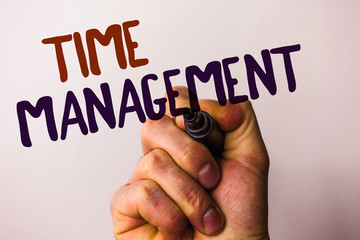 Word writing text Time Management. Business concept for Schedule Planned for Job Efficiency Meeting Deadlines Man holding pen pointing idea message black red letters white background