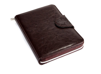 Brown leather notebook on a white background