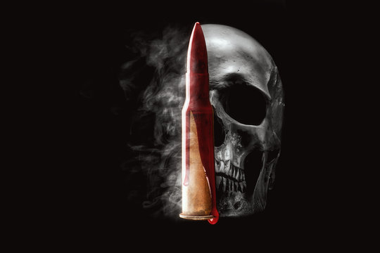 Human skull, bullet, blood and smoke on black background. Crime, war concept. 