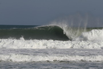 waves crashing on rocks