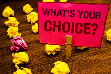 Fototapeta premium Conceptual hand writing showing What S Your Choice Question. Business photo showcasing Option Decision Preferred Opinion Preference Paperclip retrain pink card with letters wooden floor hunch