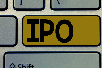 Handwriting text Ipo. Concept meaning Very first sale of stock issued by a company to the public as investors.