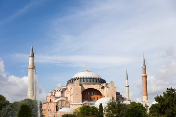 Fototapeta na wymiar Hagia Sophia domes and minarets in the old town of Istanbul, Turkey