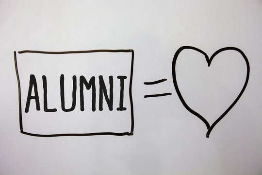 Conceptual hand writing showing Alumni. Business photo showcasing Alum Old graduate Postgraduate Gathering College Academy Celebration Ideas messages heart white background intentions feelings