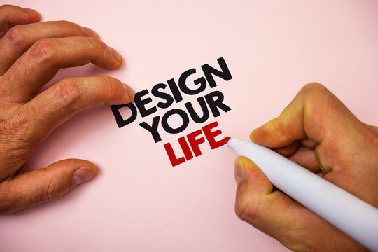 Writing note showing Design Your Life. Business photo showcasing Set plans Life goals Dreams take control To do list Marker pen paper Ideas messages remember information important pink