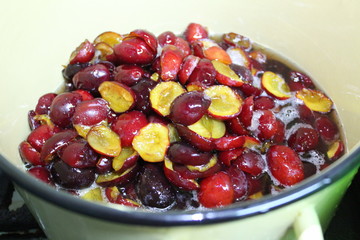 halves of plums pitted with sugar