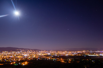 Moon, Saturn and Jupiter above the City