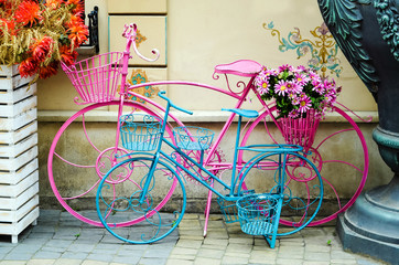 art design decor of bicycle with basket and beautiful flowers