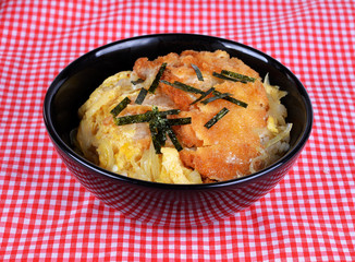 japanese cuisine, pork cutlet and egg on rice (katsudon)