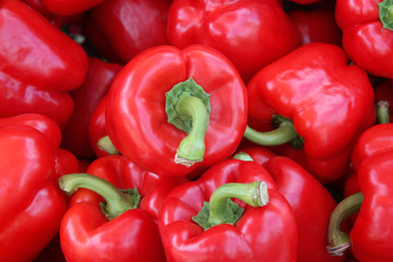 red peppers on a wooden background