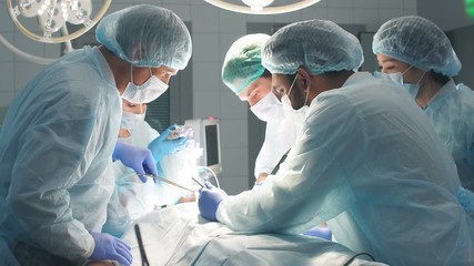 Successful teamwork of medical team, professional treatment and professional conduct concept.