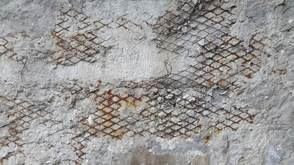 Concrete surface. Concrete. Destroyed concrete surface reinforced mesh. Vintage abstract background. Old destroyed concrete surface