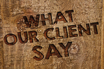 Word writing text What Our Client Say. Business concept for Customers Feedback or opinion about product service Message banner wood information board post plywood natural brown art