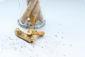 Homemade hard breads with thymes sprinkling on it, isolated, close up