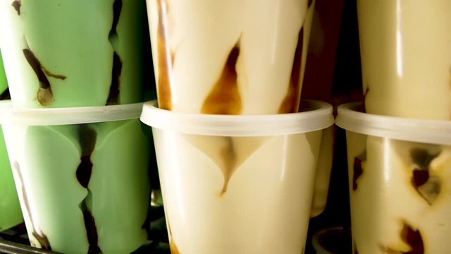 Different Types Of Colourfull Ice Cream In The Fridge Close-up