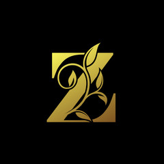 Z Gold Letter Logo With Luxury Floral Design. Vintage Z drawn letter mark for book design, brand name, business card, Restaurant, Boutique, Hotel.  