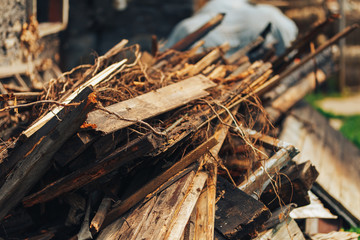 Abandoned wooden building, a ruin built of wood planks, destroyed, collapsed property
