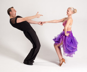Ballroom dancing Latin Samba, purple dress, black pants,beautiful dancers