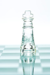 Chess glass transparent king isolated on white
