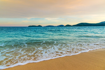 Beach sunset or sunrise with colorful of cloud sky and sunlight