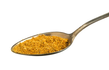 A mixture of seasonings in a bowl isolated on a white background. Spice on isolate. View from above.