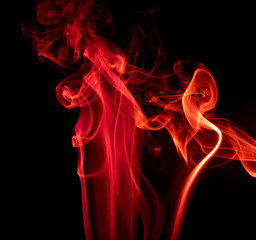 Obraz premium Red smoke on black background