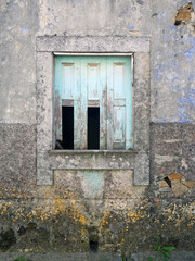 old window in stone wall