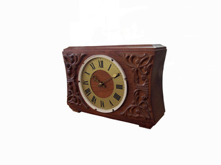 Photo of an old clock isolated on a white background.