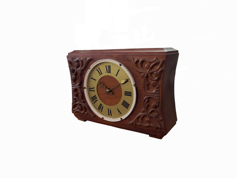 Photo of an old clock isolated on a white background.