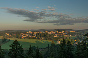 Fototapeta premium Rotava town in sunrise time with block of flats in summer morning