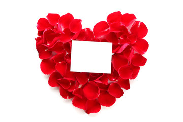 Beautiful heart of red rose petals with blank paper