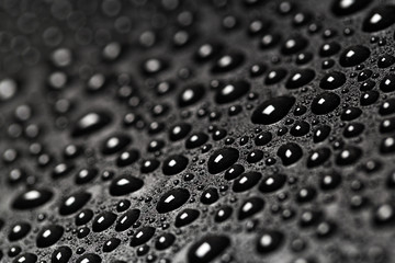 abstract water drops on a dark black  background