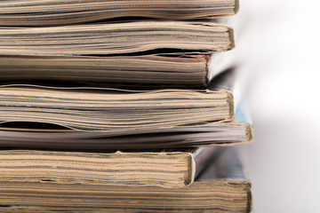 selective focus of the stacking magazine place on white background
