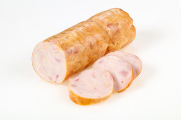 Tasty meat sausages over white background