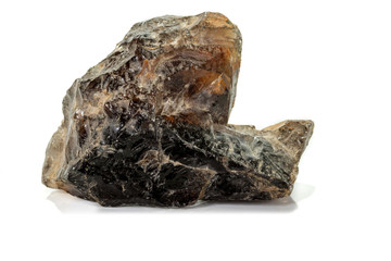 Macro mineral stone smoky quartz, rauchtopaz on a white background