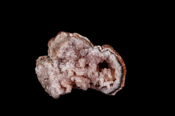 Macro mineral stone Pink Amethyst on a black background