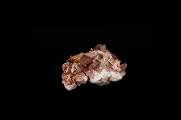 Macro mineral stone Pink Amethyst on a black background
