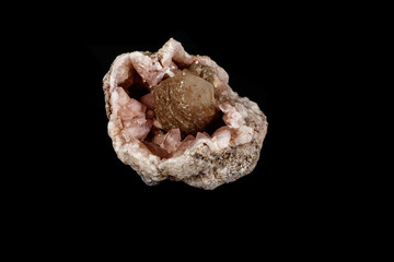 Macro mineral stone Pink Amethyst on a black background