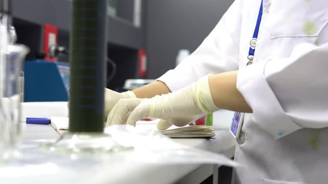Asian scientist working in the lab,Female doctor experiment from sample,Thailand people,Researcher work in the laboratory