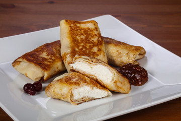 Pancakes stuffed curd with jam