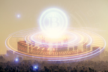 Double exposure of crypto currency theme hologram drawing and city veiw background. Concept of blockchain and bitcoin.