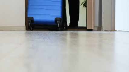 Businessman Image Walking in a Lobby Carry a Suitcase on the Floor Parquet