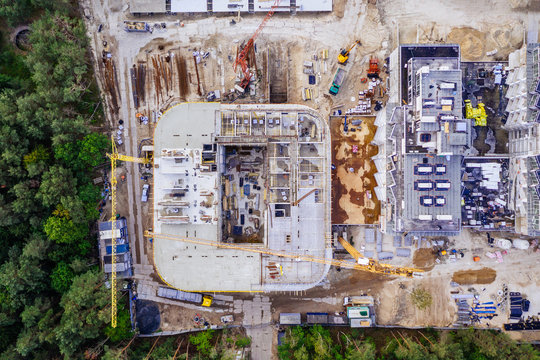 Aerial top-down view of a construction site of the coastline resort. Swinoujscie, Poland.