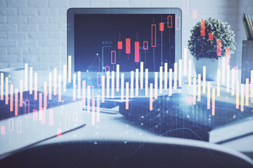 Forex Chart hologram on table with computer background. Double exposure. Concept of financial markets.